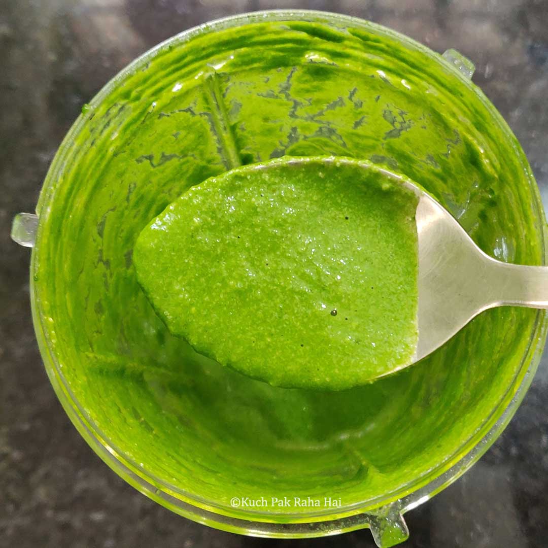 Green chutney in blending jar.