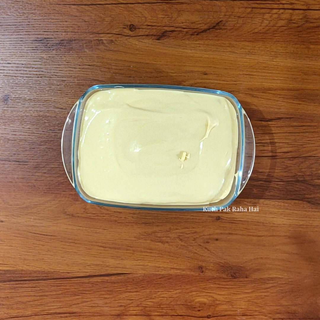 Transferring ice cream mixture in freezer safe container.