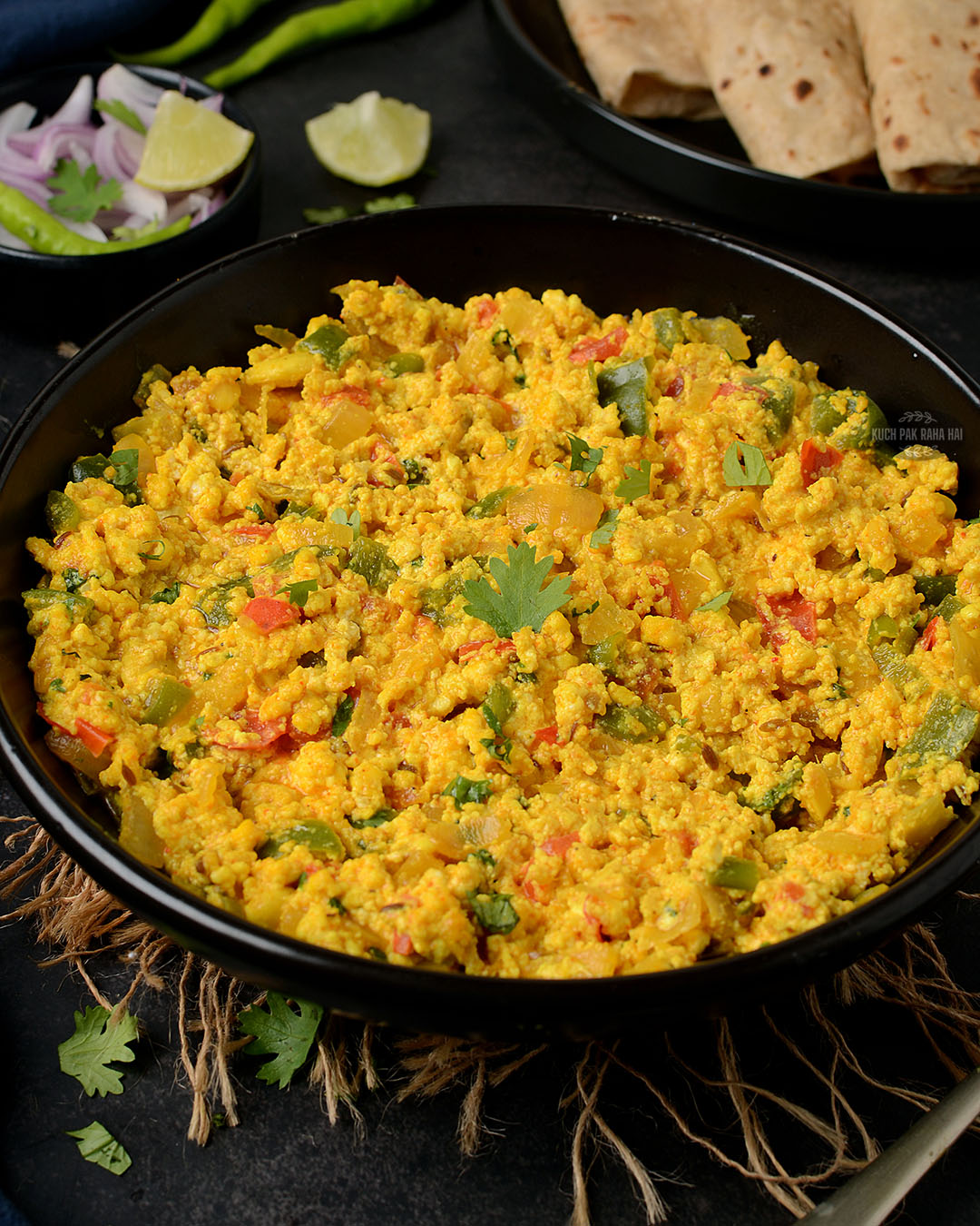 Indian cottage cheese bhurji served with roti.