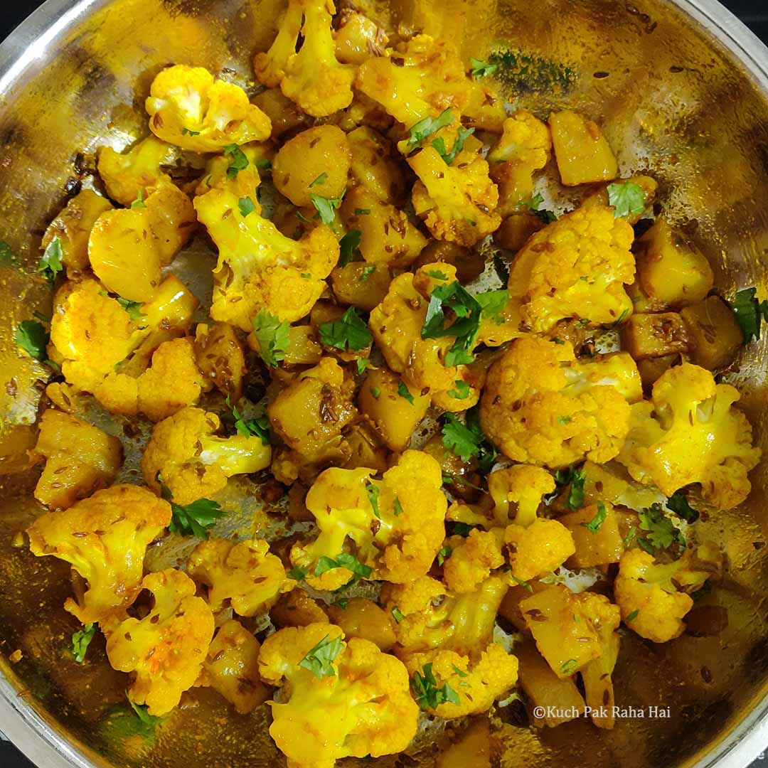 Aloo gobhi ready in a pan.