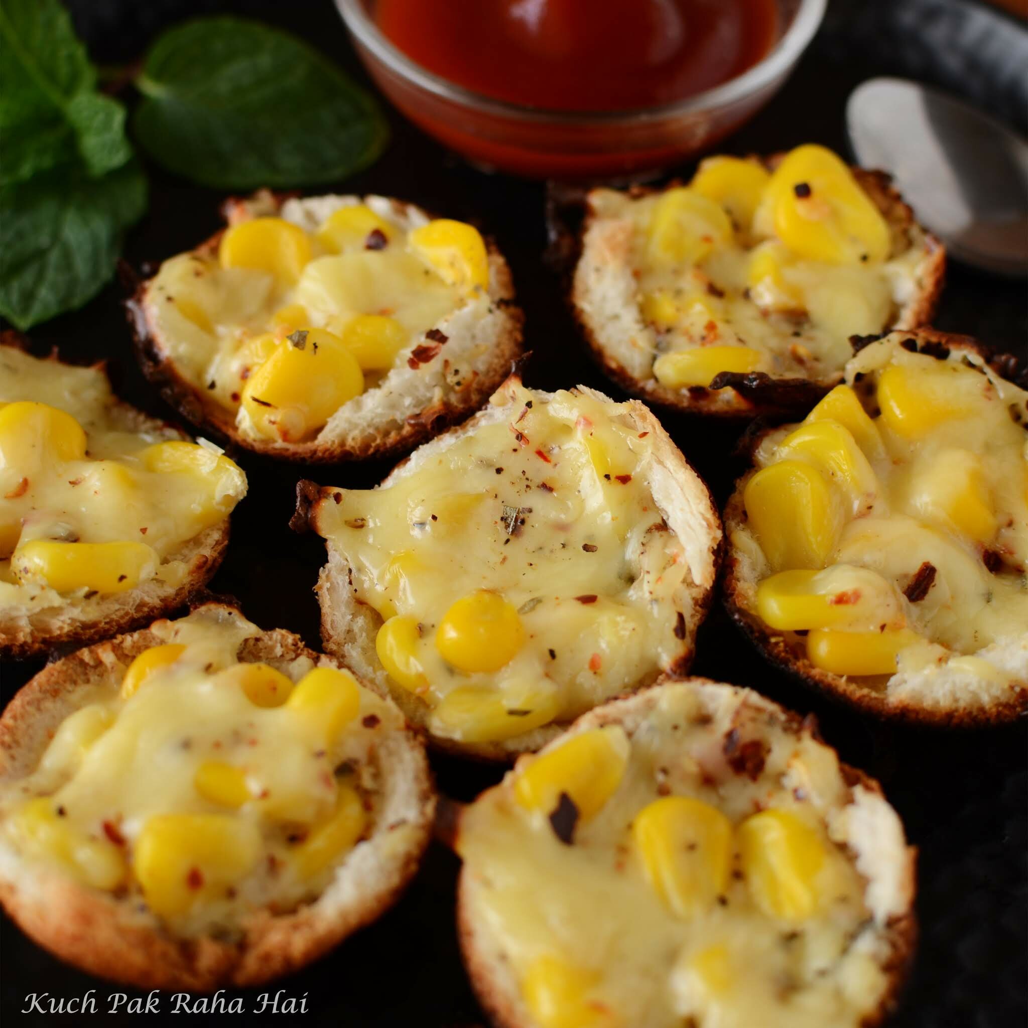 Cheese corn canapés or cups made in appe pan.