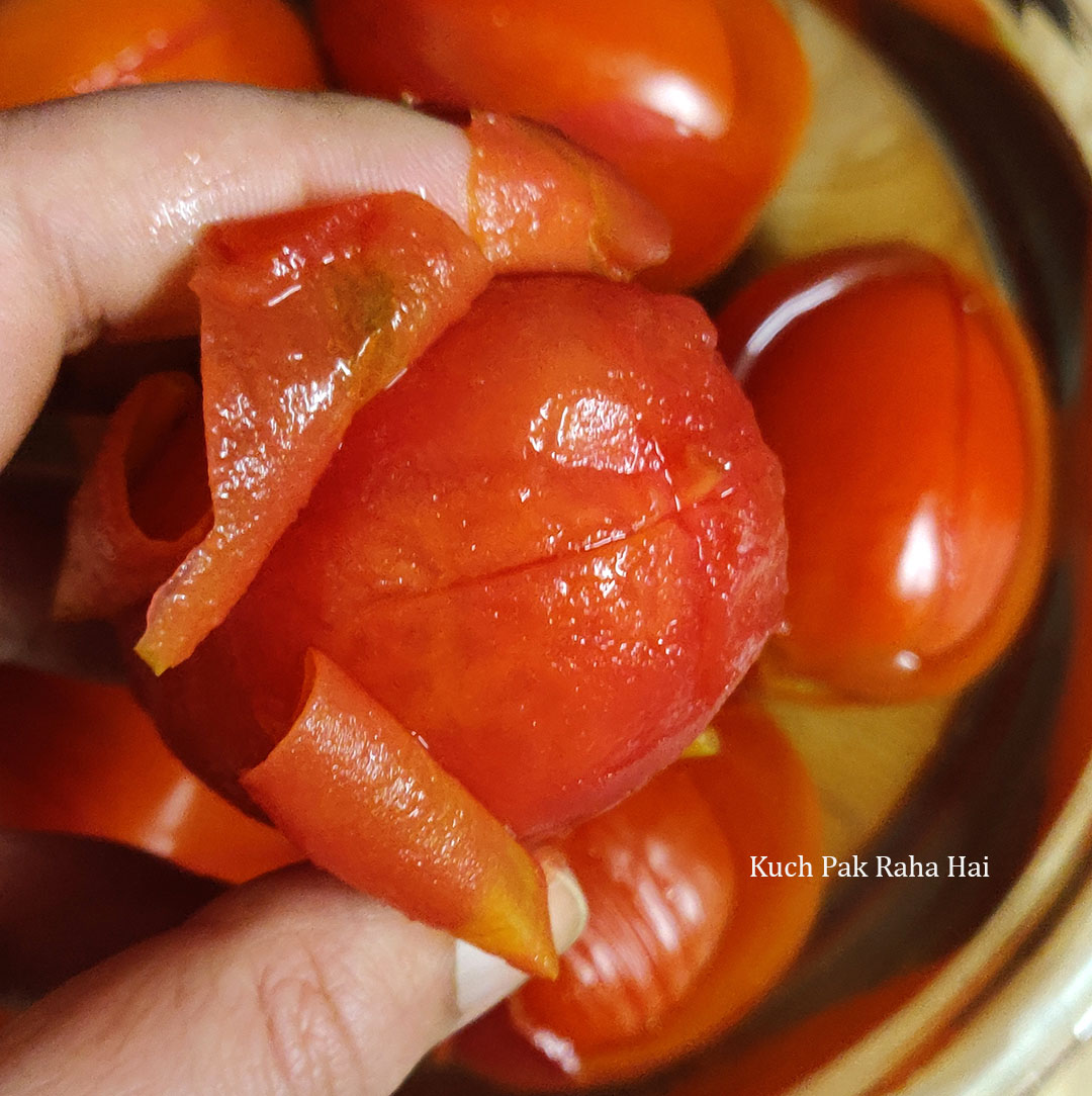 Peeling tomatoes.