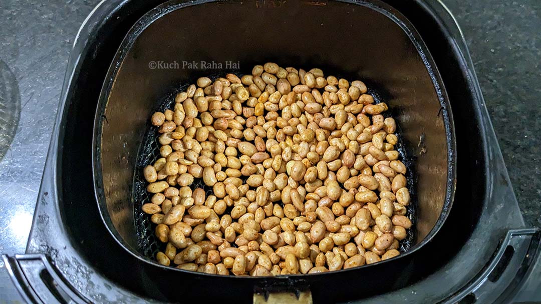 Raw peanuts in air fryer.