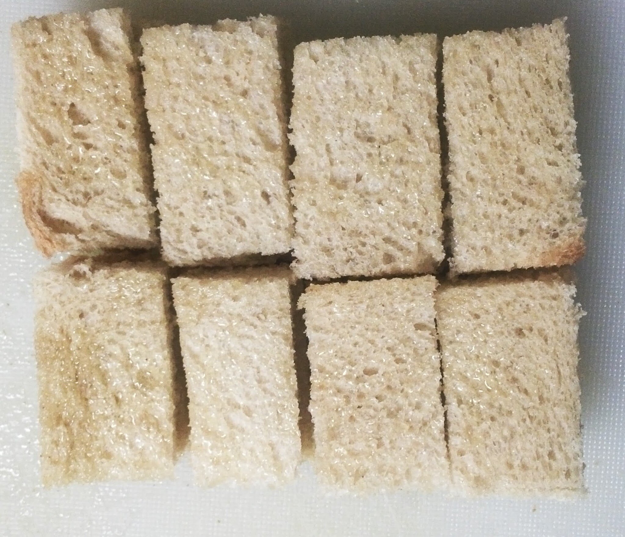 Cutting bread for croutons.