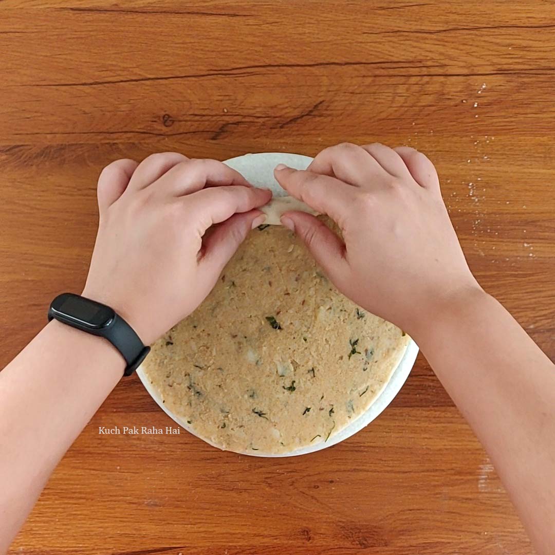 Rolling the dough with filling.