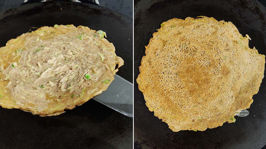 Flipping cheela using a spatula to cook from other side.