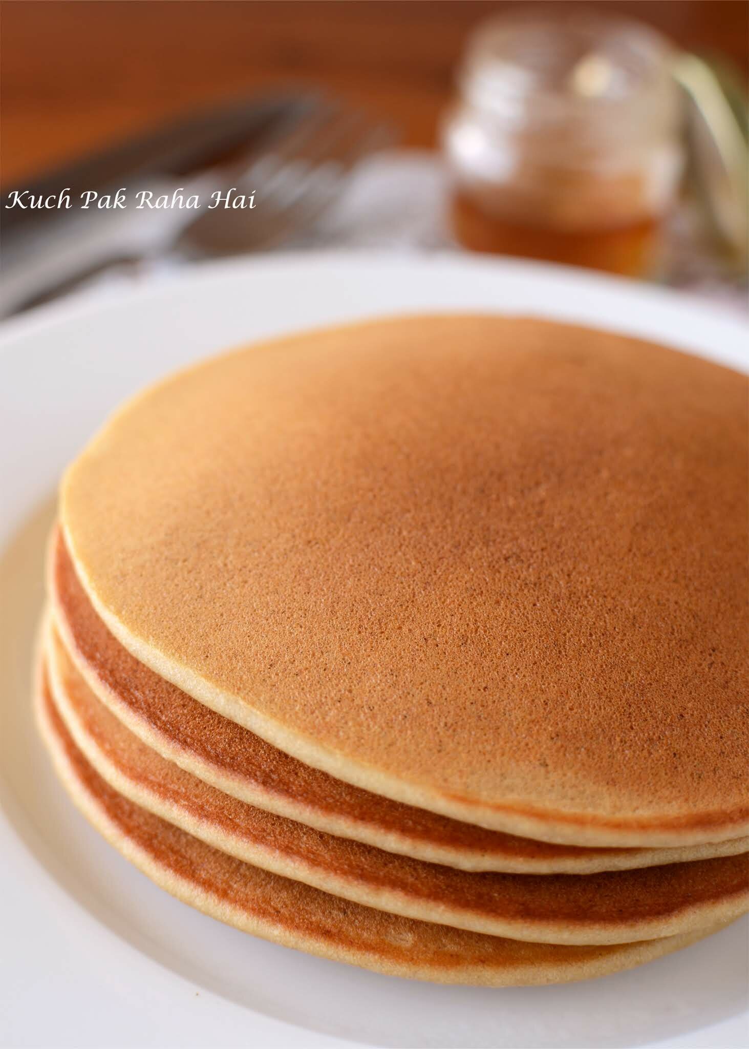 Eggless Banana Pancakes recipe made using whole wheat flour