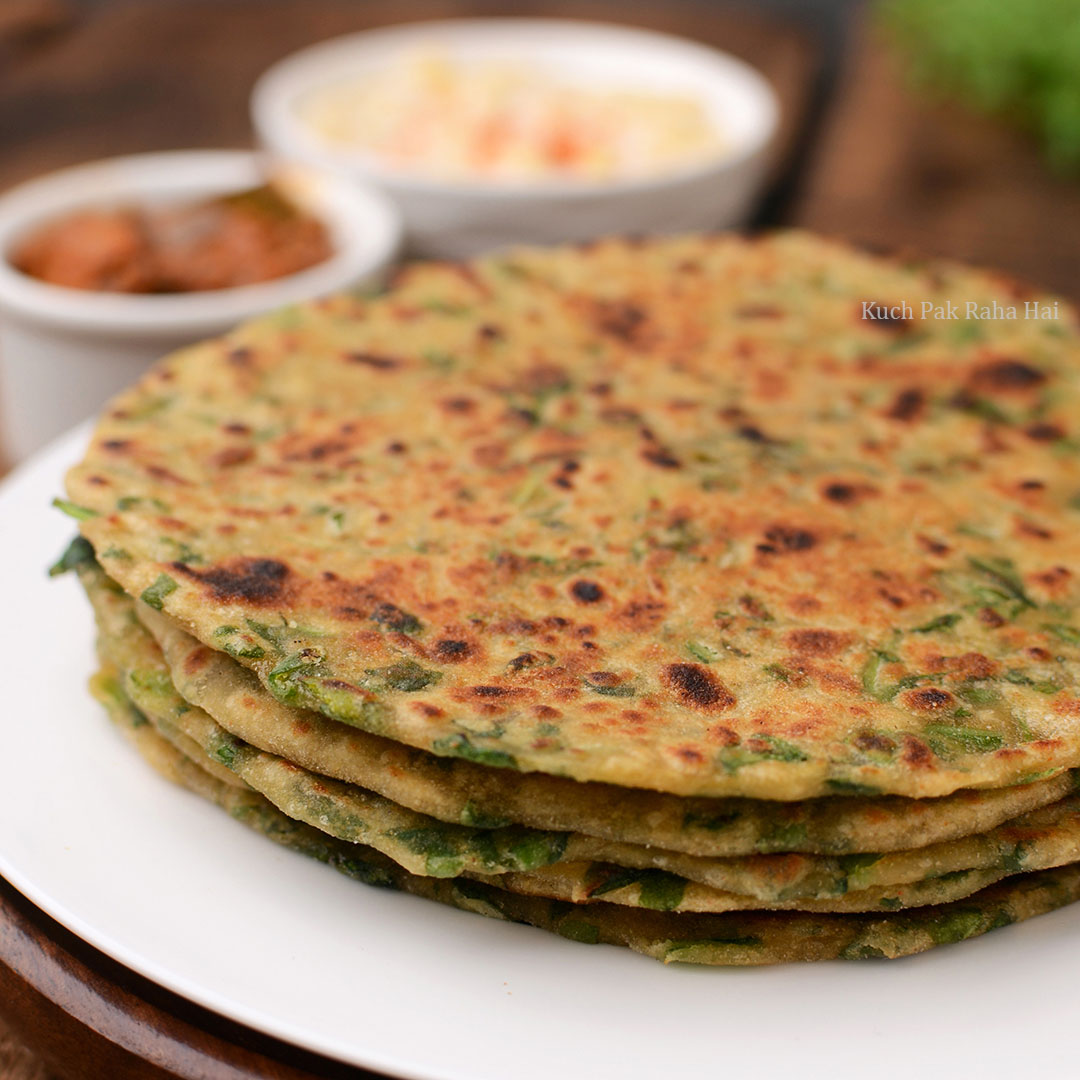 Methi Palak Paratha served with pickle & boondi raita.