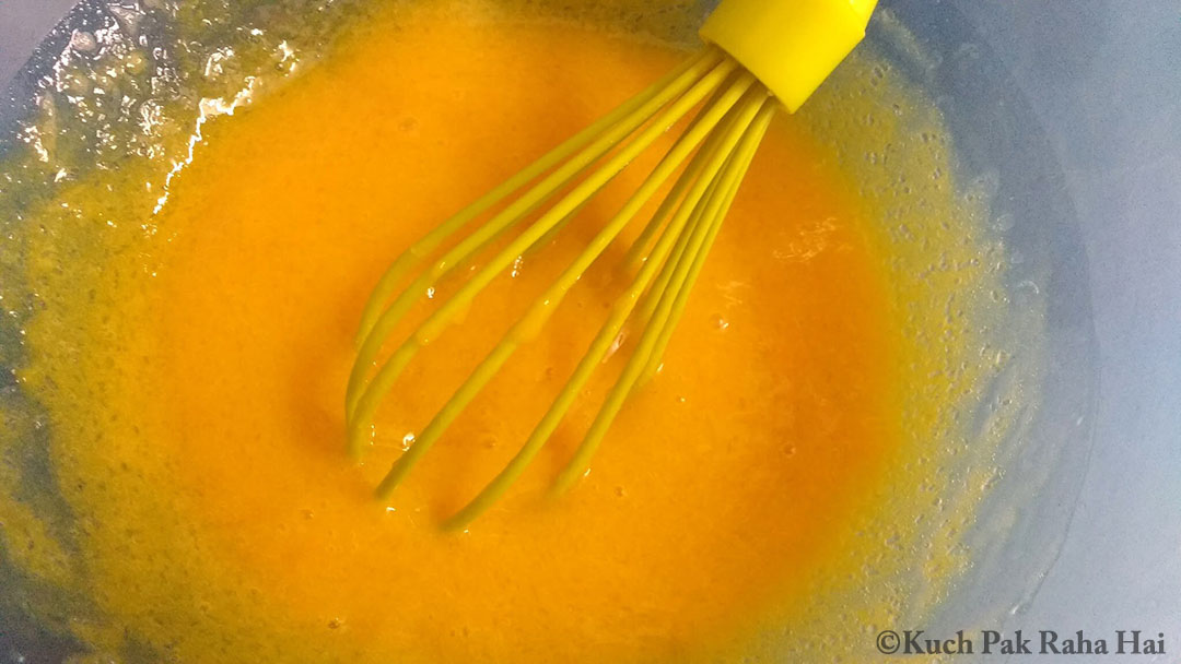 Mixing mango puree with milk sugar.
