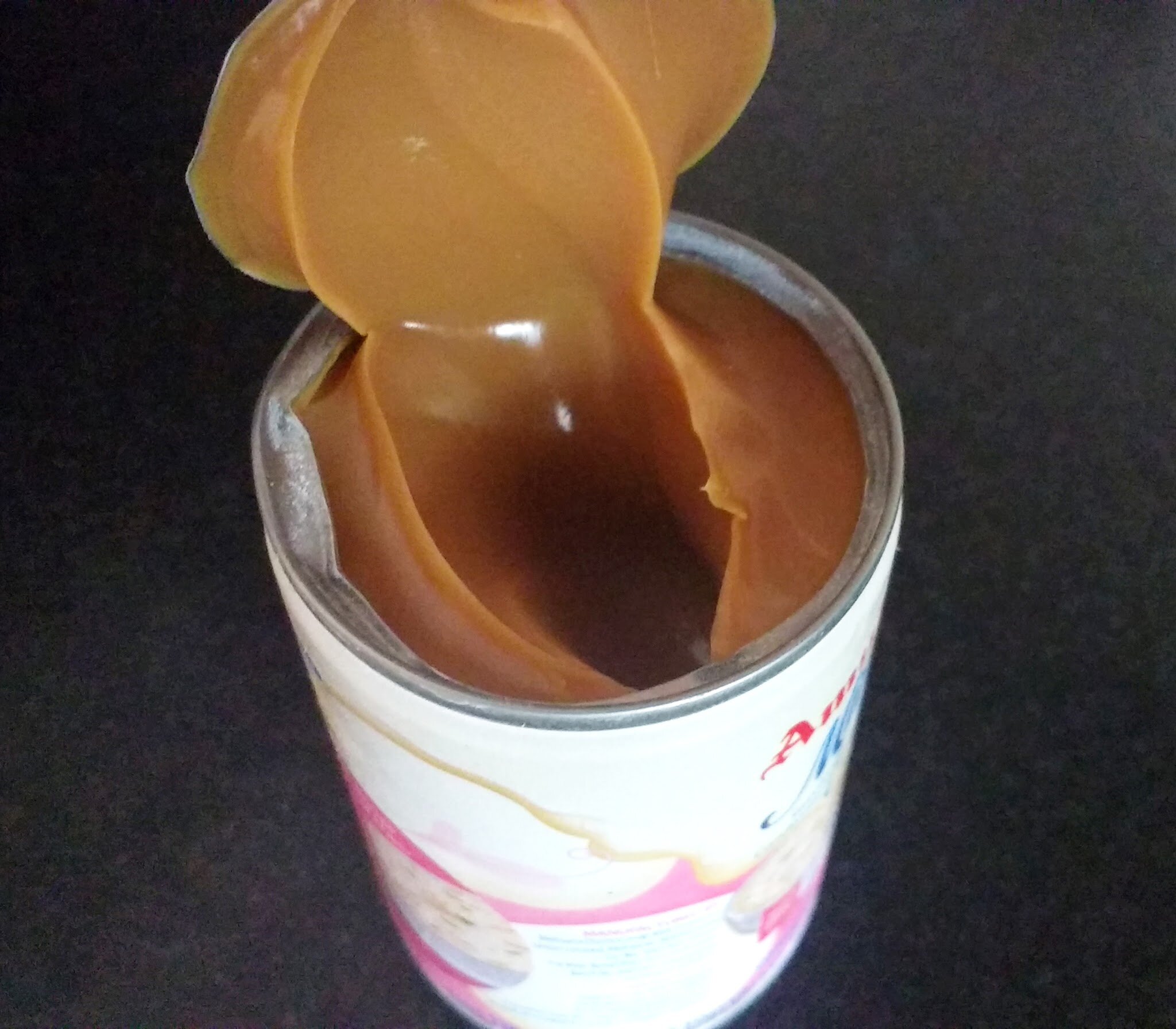 Dulce de leche prepared from condensed milk can.