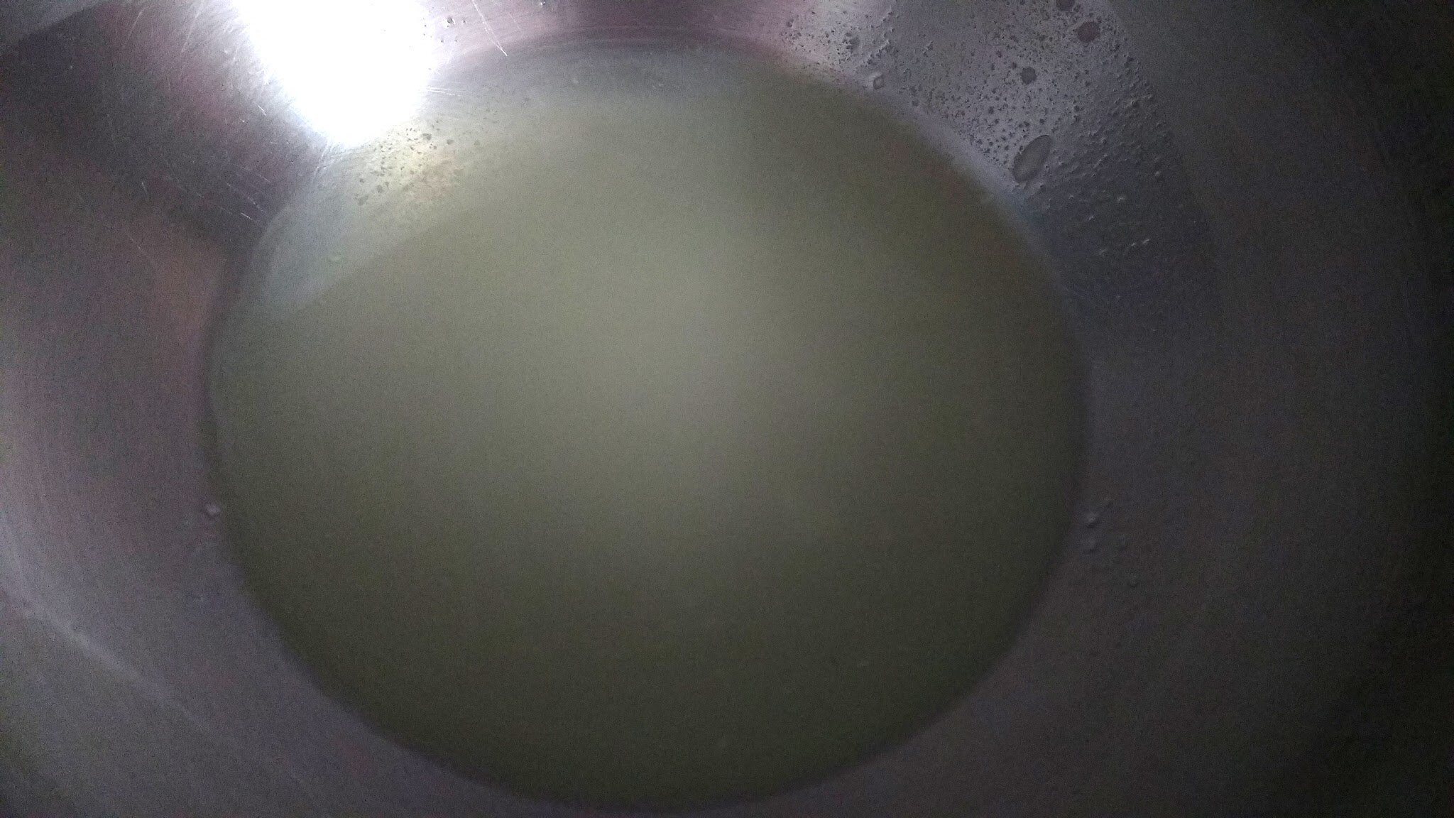 Water separated from hung curd.