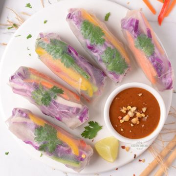 Vegetarian rice paper rolls with peanut dipping sauce.
