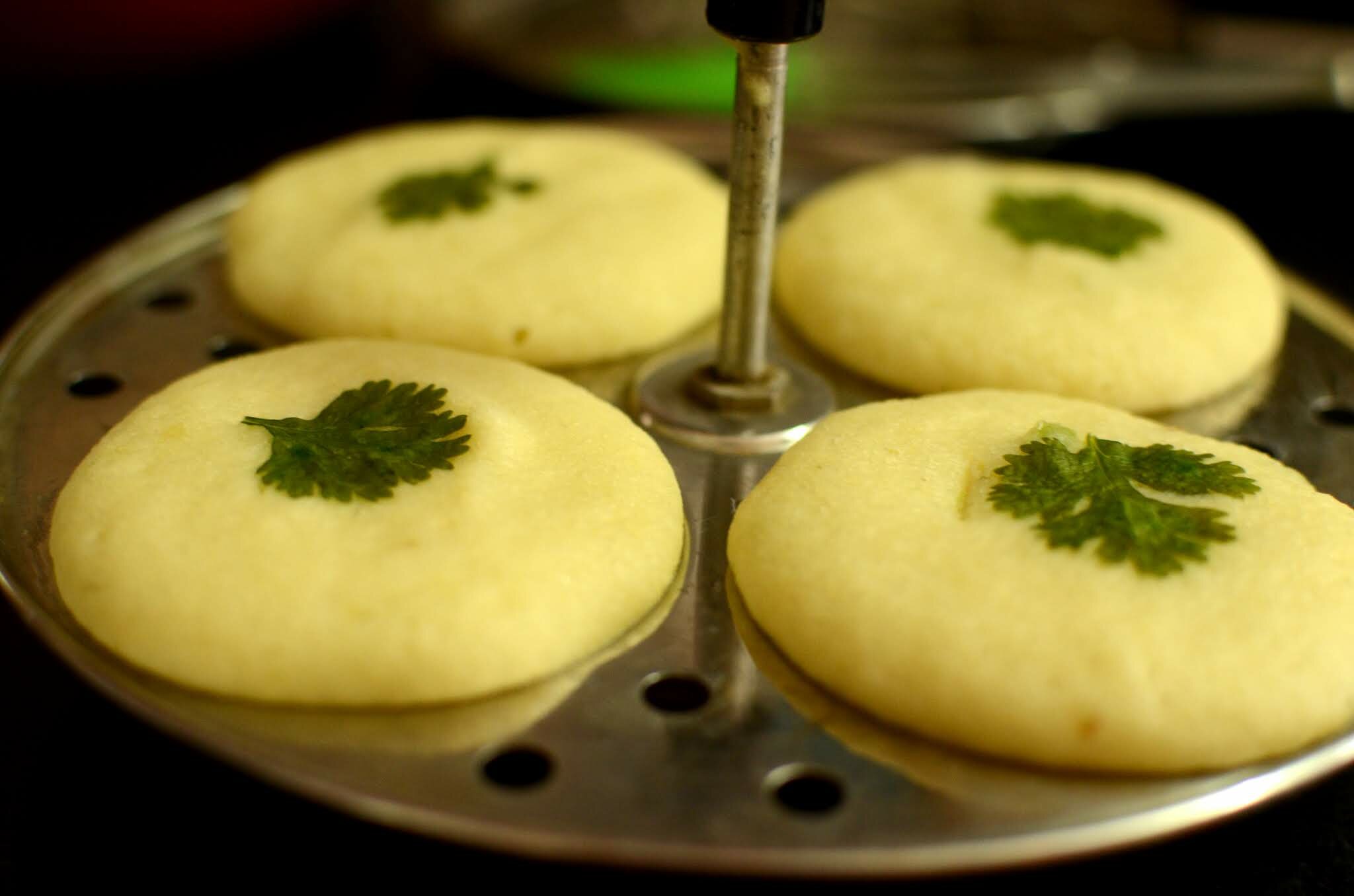 Cooling down moong dal idli.