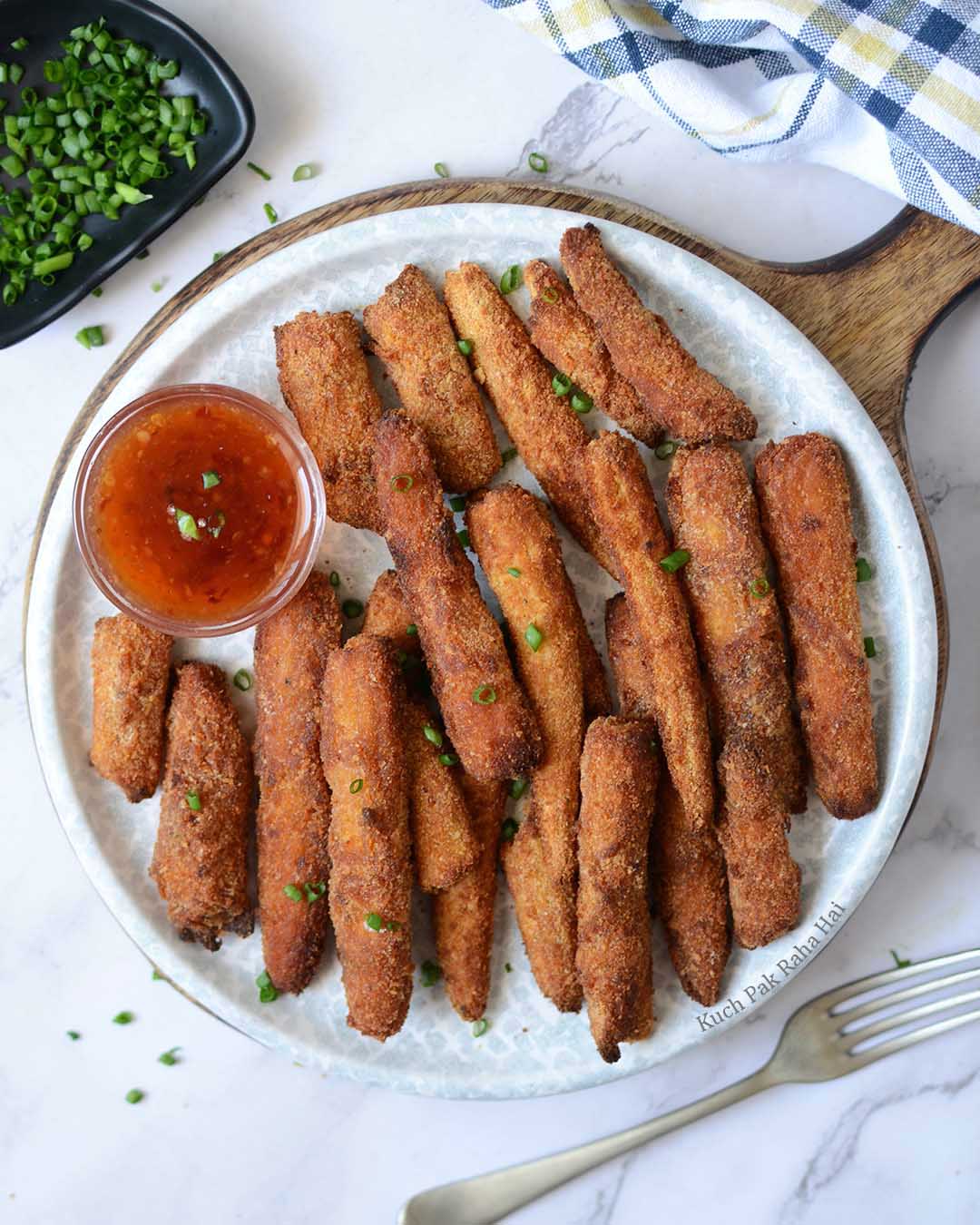 Air fryer baby corns served with Sweet Chilli Sauce