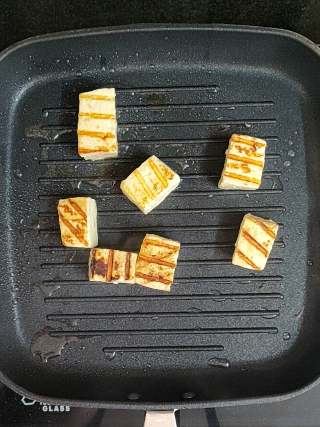 Grilling paneer.