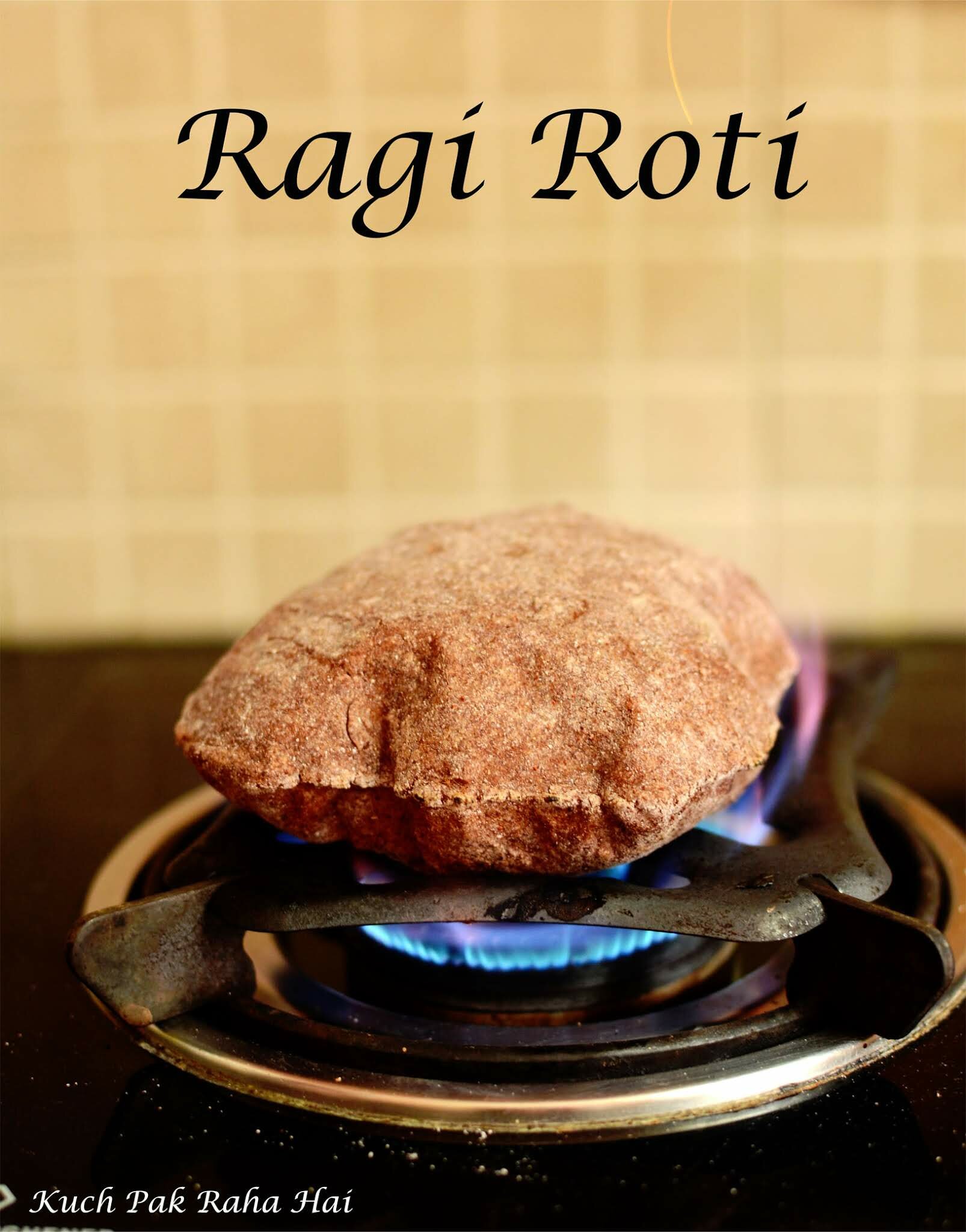 a ragi roti being made on a stove