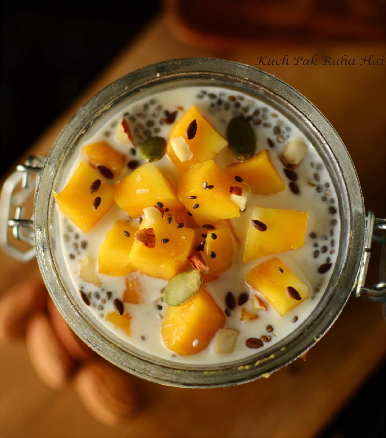 Mango Overnight Oats with fresh mangoes, nuts & seeds.