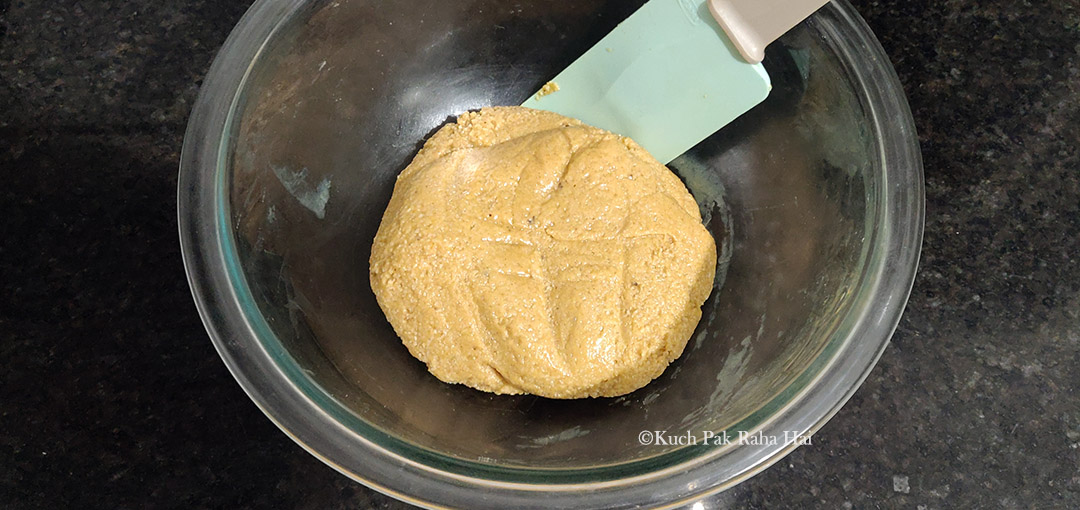 Making almond peanut butter cookie dough.