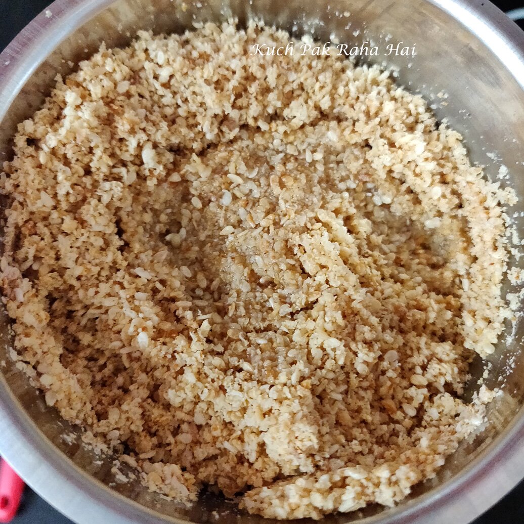 Grinding sesame seeds for tahini sauce.