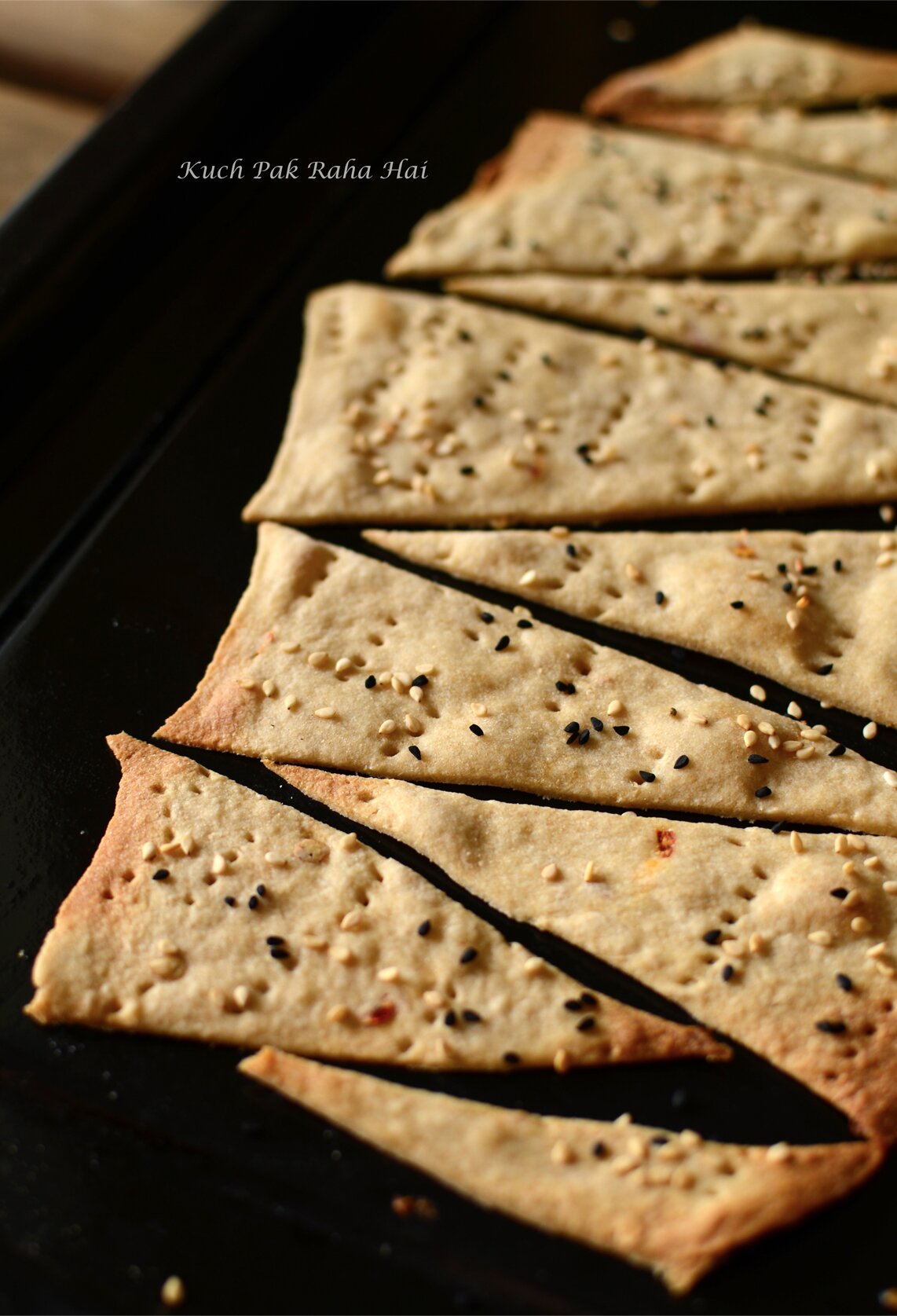Lavash crackers cooling down on baking tray.