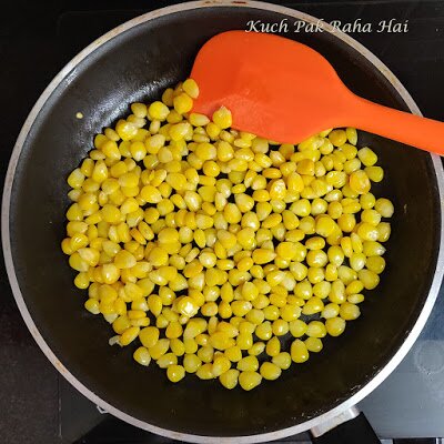Roasting corn kernels.