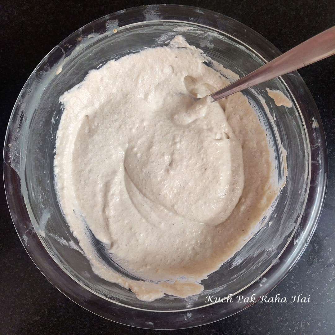 Fermented appam batter in a bowl.