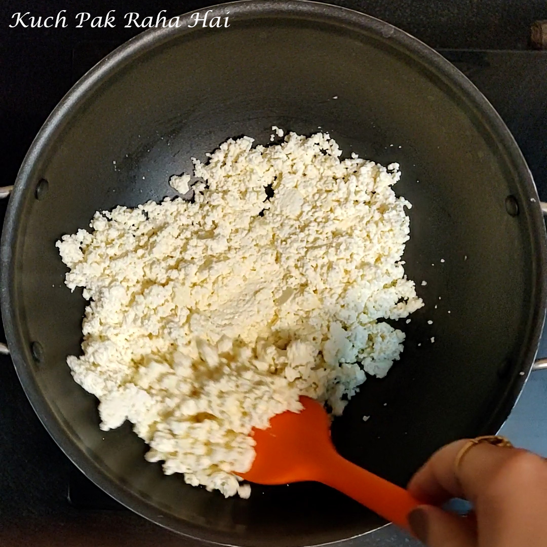 Sautéing paneer in ghee.