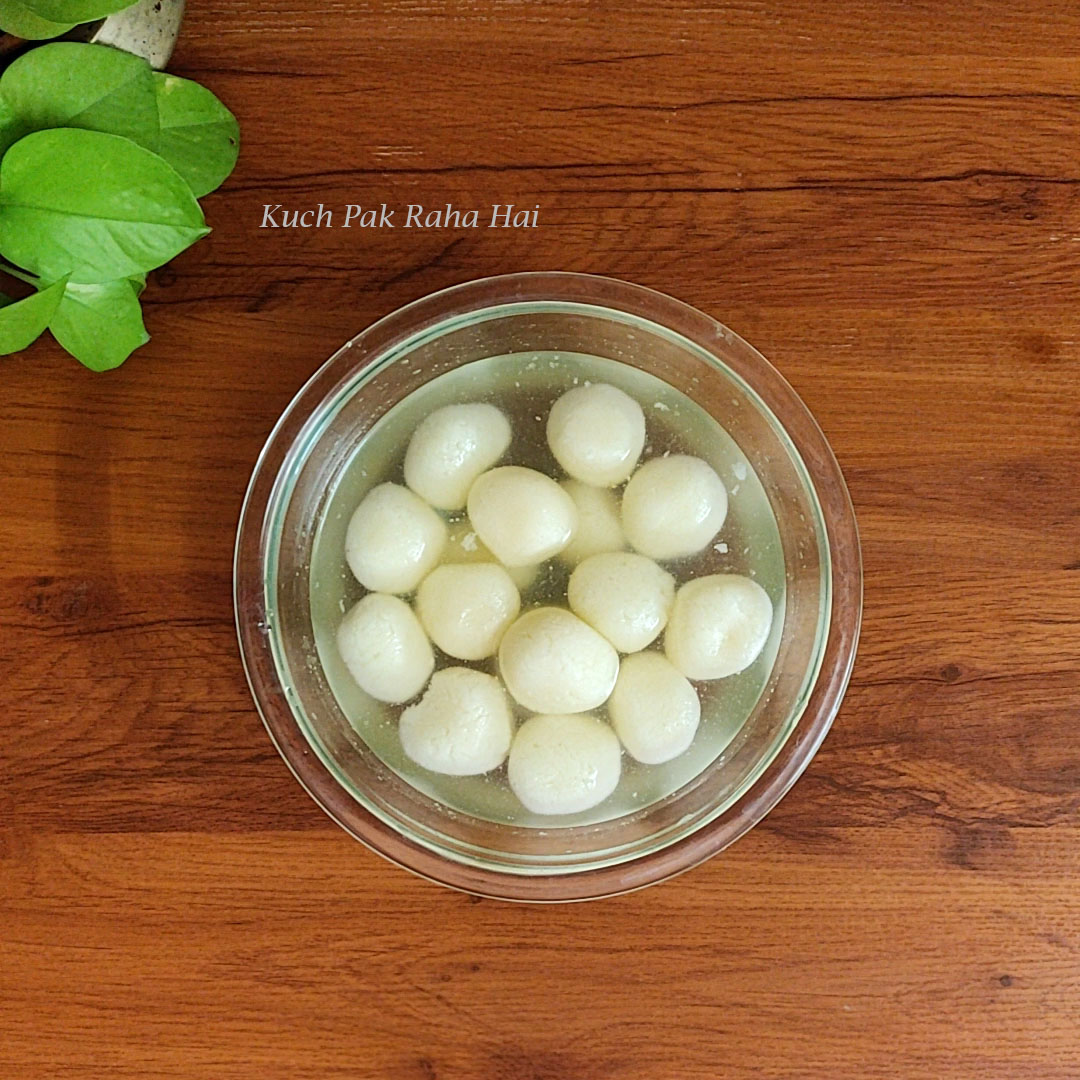 Bengali Rasgulla with syrup in a bowl.