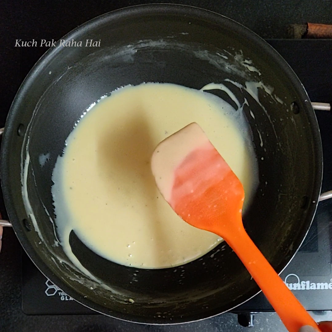 Adding condensed milk to milk & khoya.