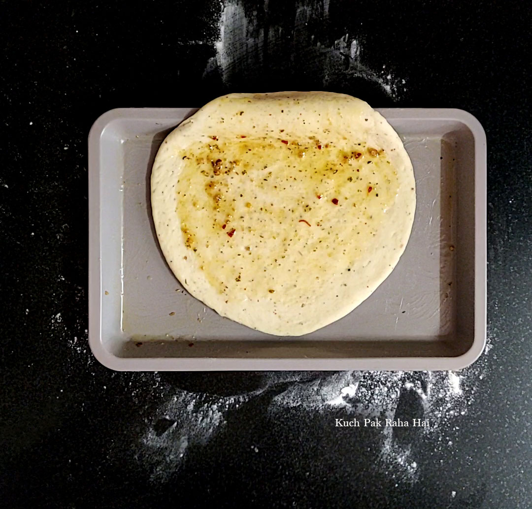 Shaping garlic bread.