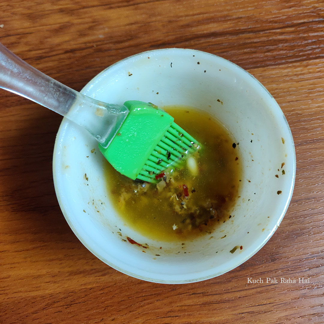 Preparing garlic butter.