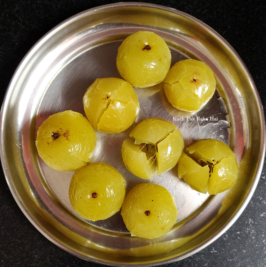 Cooked amla cooling down.