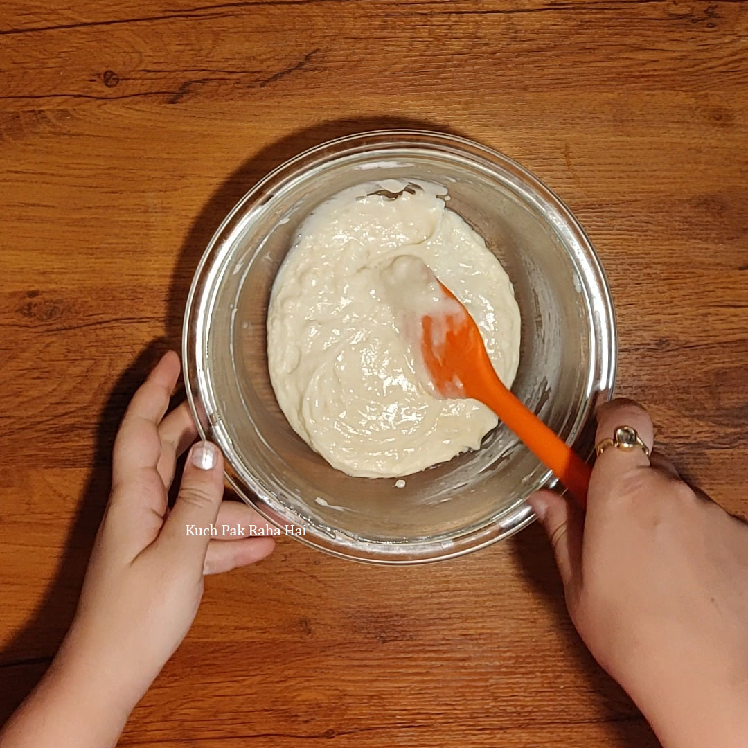 Preparing blueberry muffins batter.