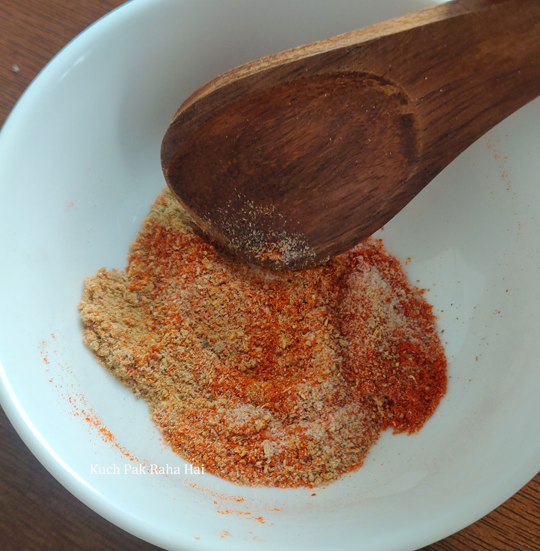 Preparing seasoning mix for air fryer chickpea.