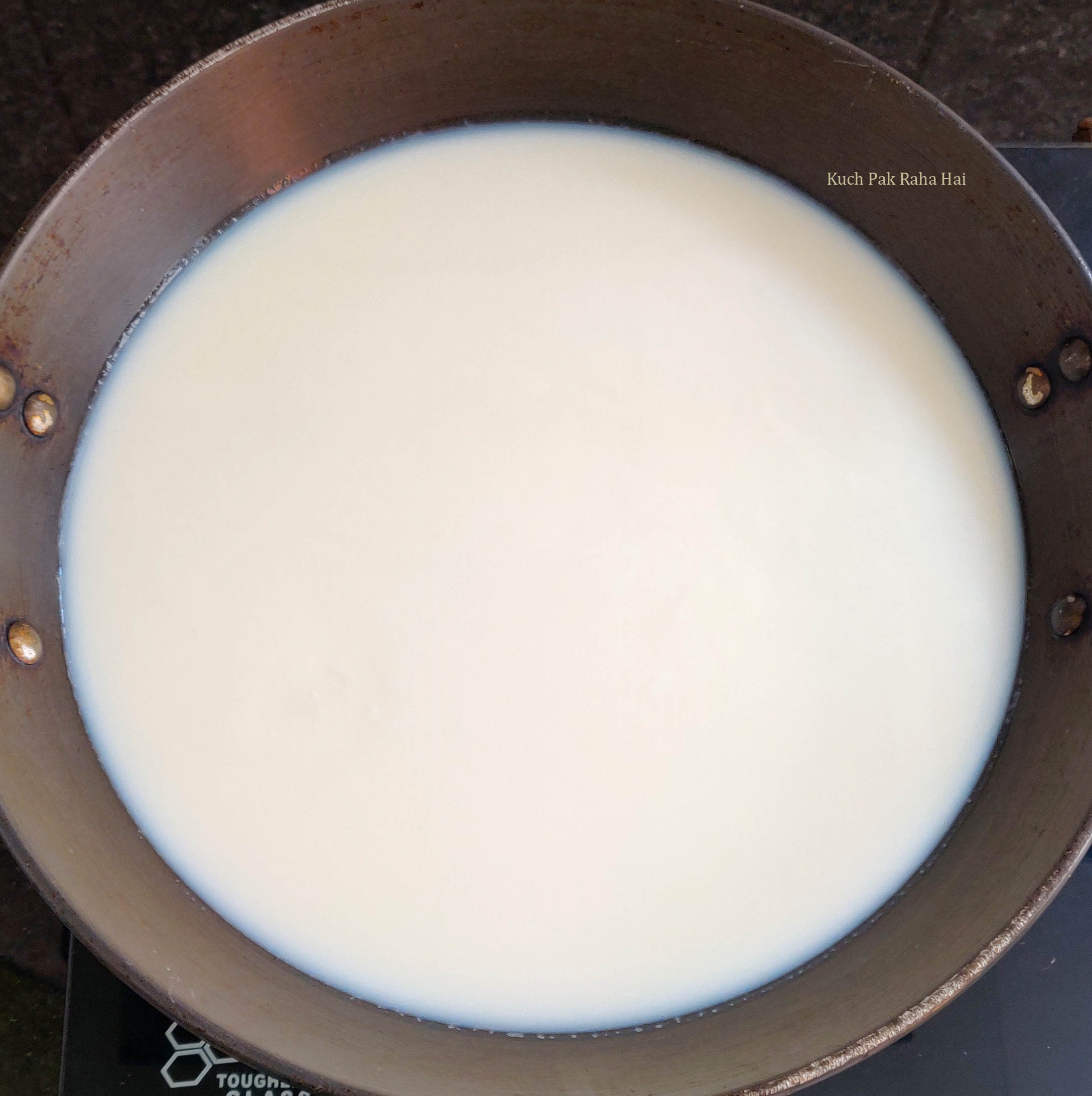 Slow cooking milk.