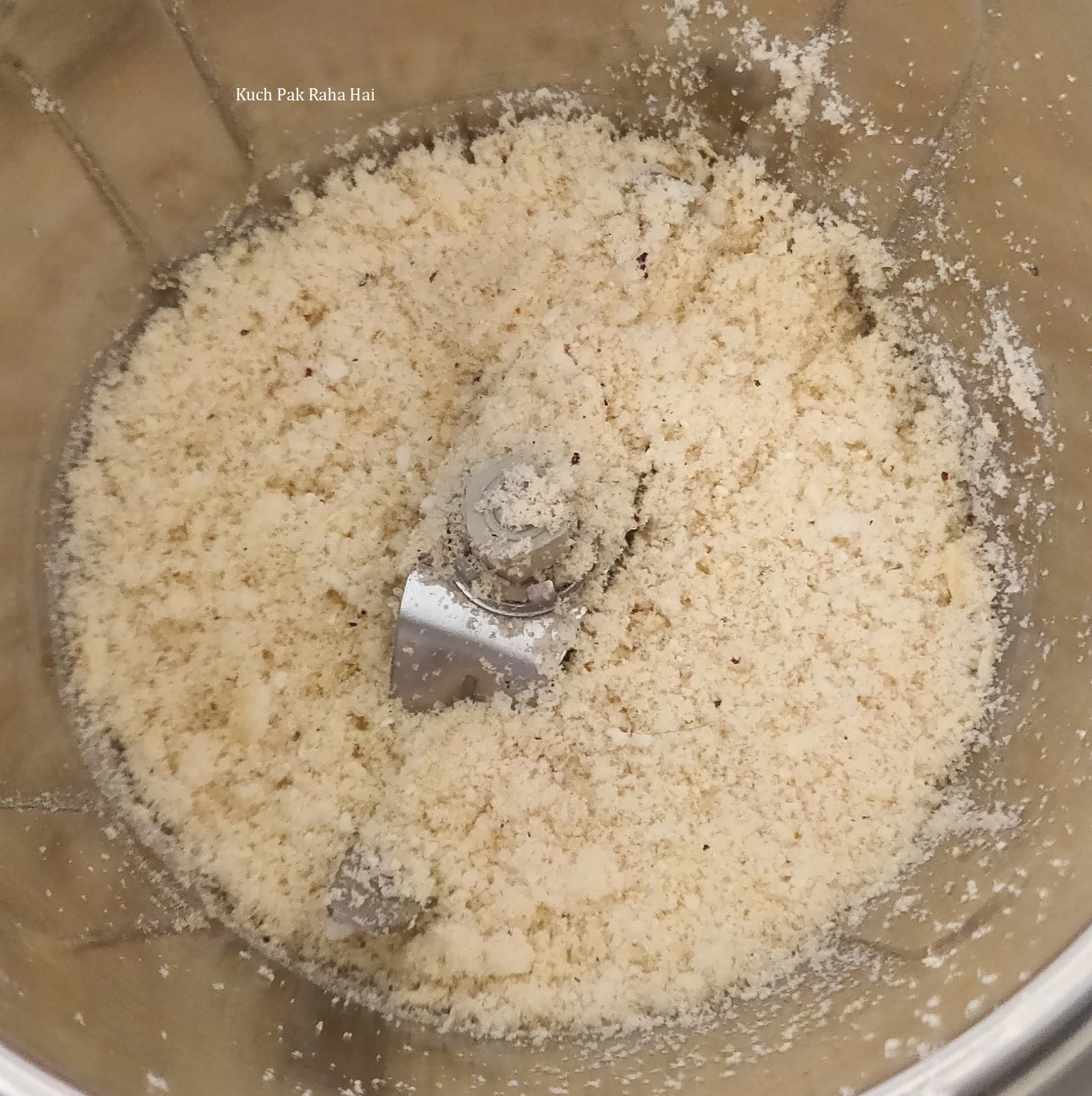 Grinding makhana for kulfi.