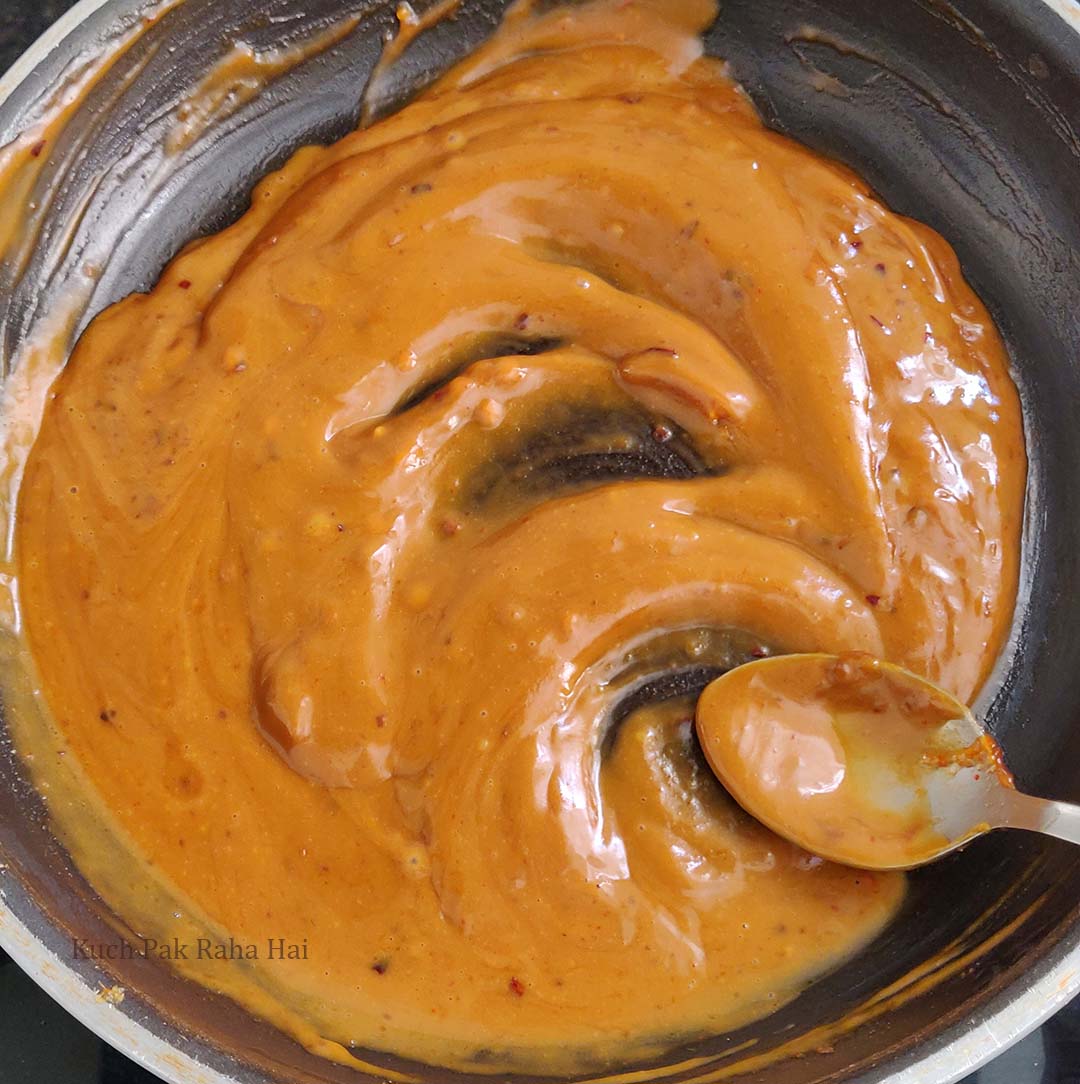 Preparing peanut sauce.