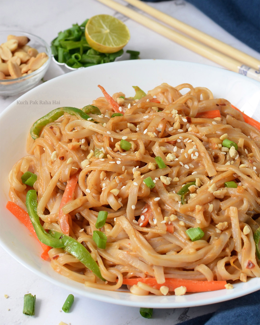 Rice noodles with peanut sauce.