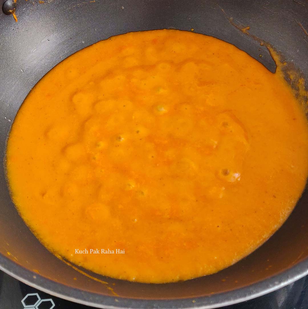 Simmering shahi paneer gravy.