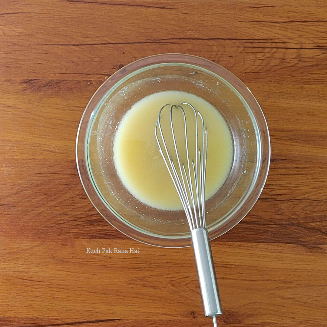 Mixing wet ingredients for cake.