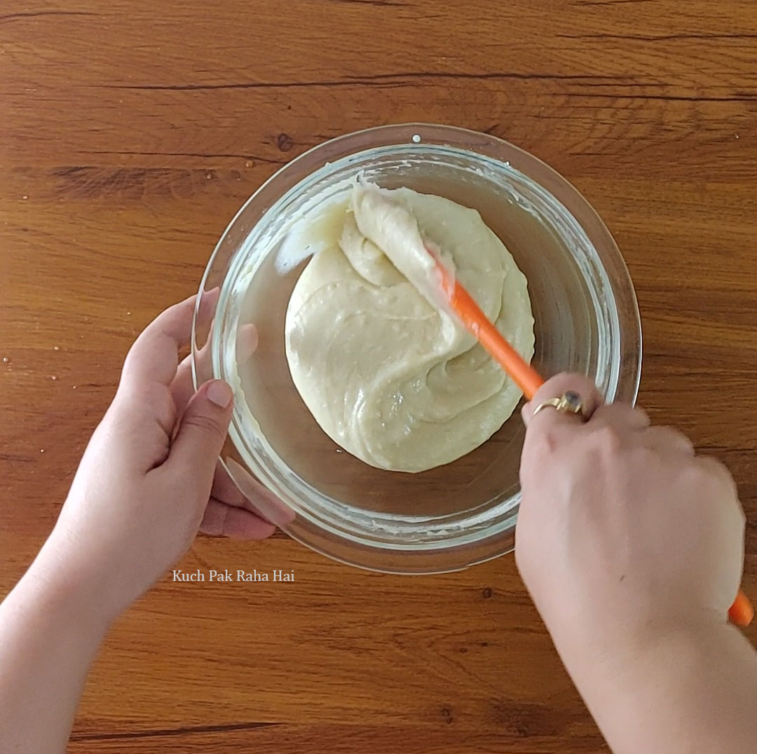 Making vanilla flavour batter for marble cake.