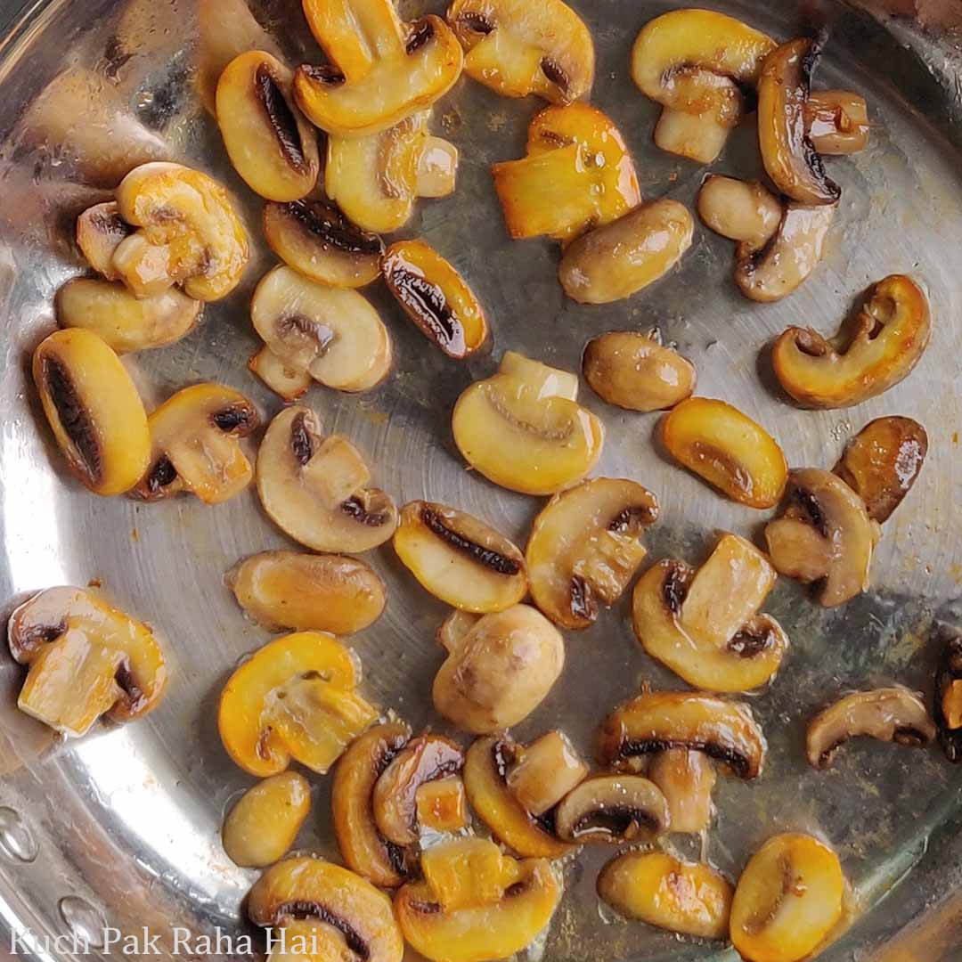 Sautéed Mushrooms in a pan.