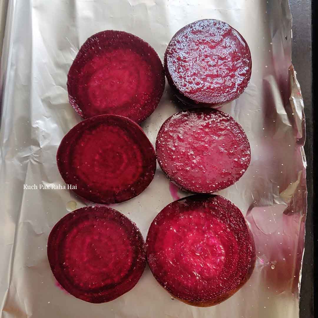 Prepping beets for roasting in oven.