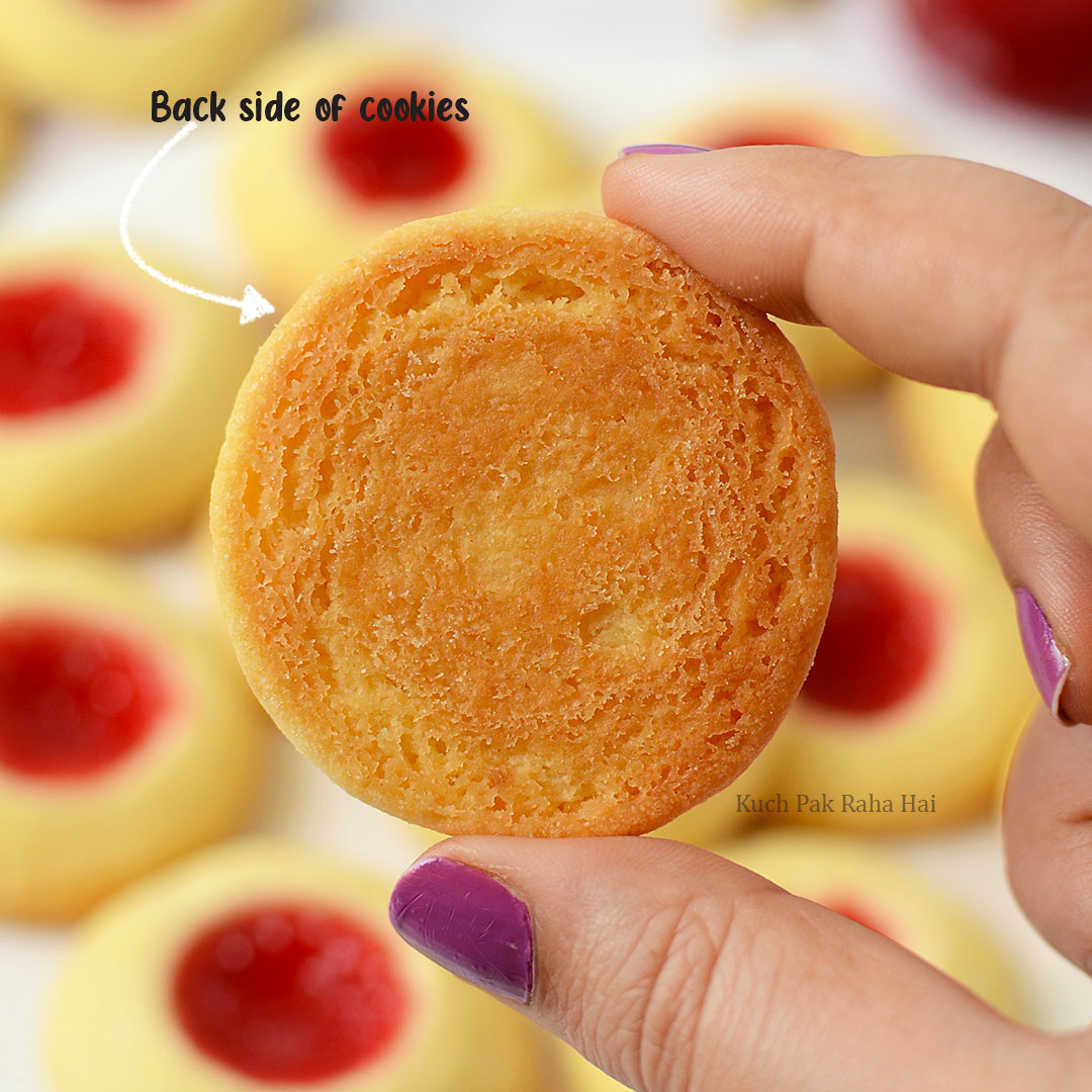 Back side of thumbprint cookies perfectly baked.