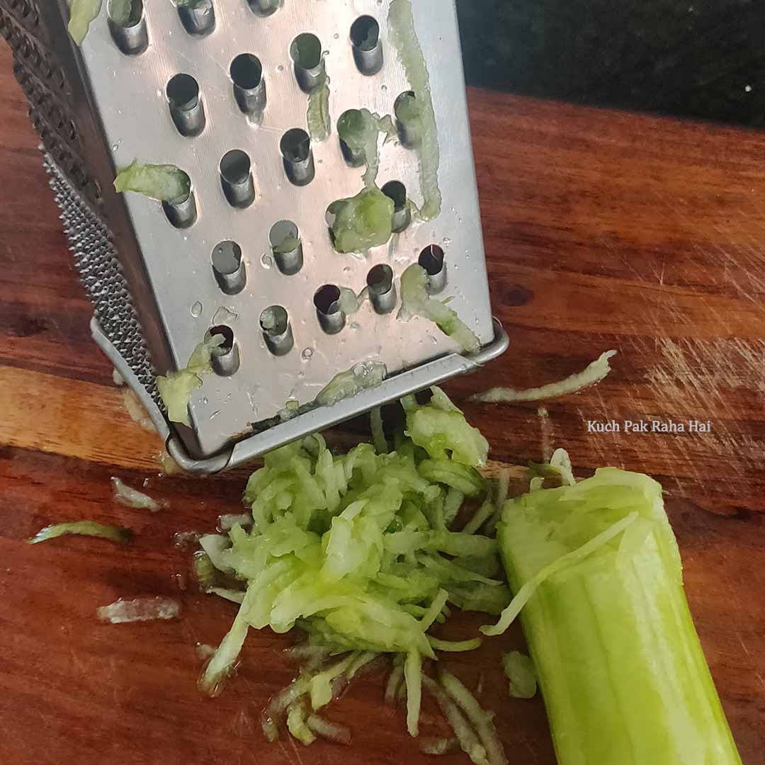 Grating cucumbers.