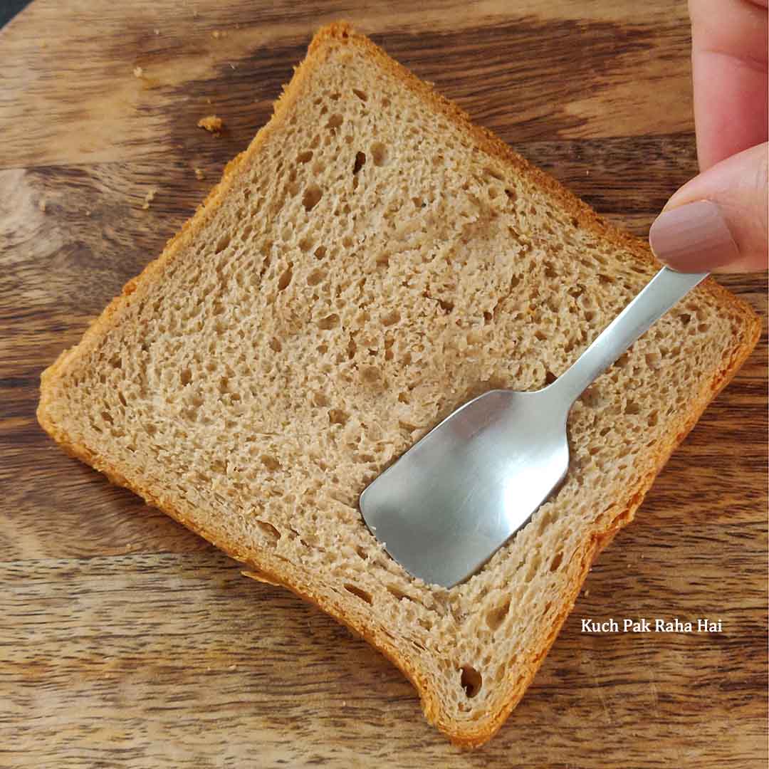 Pressing the centre of bread.