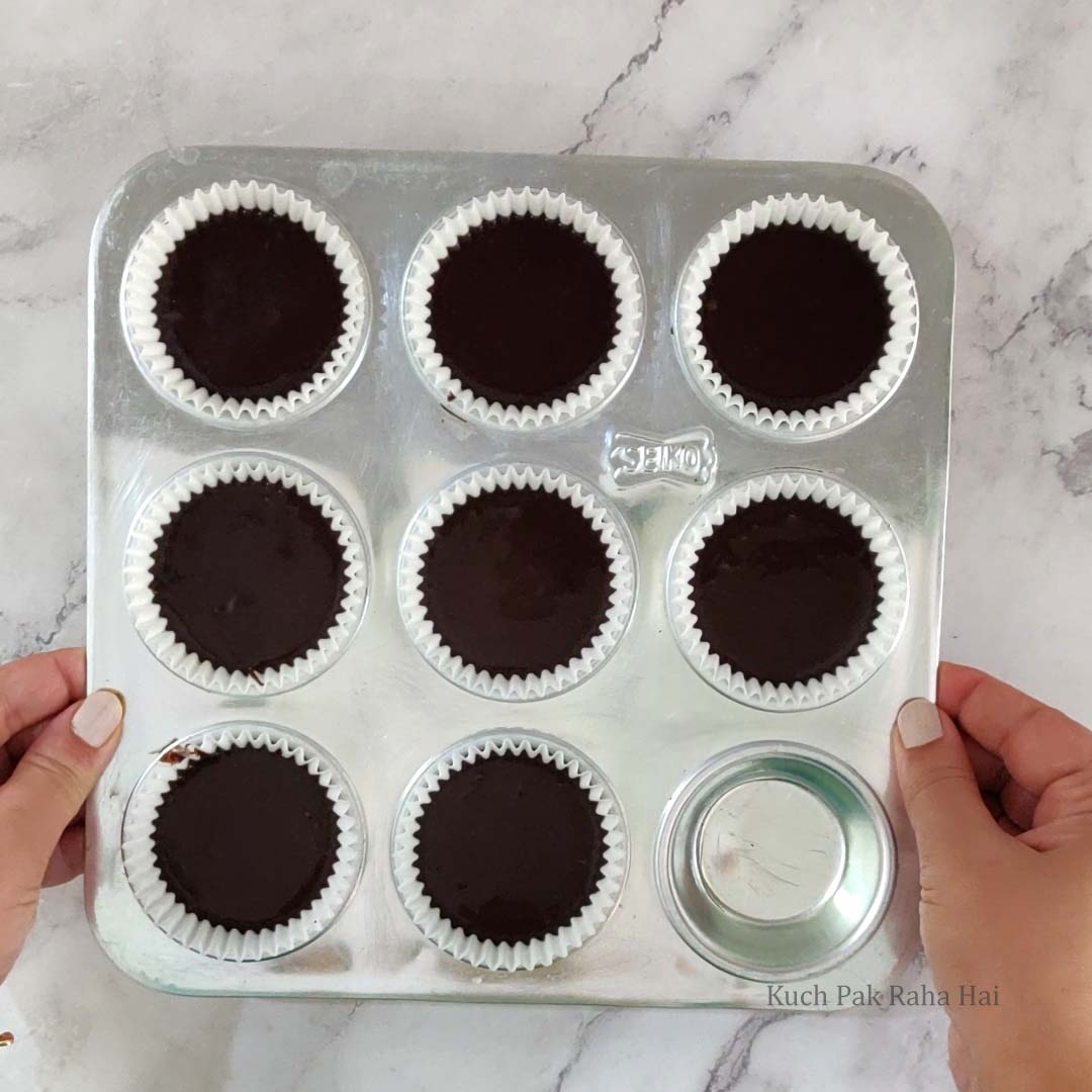 Filling Cupcake Liners.