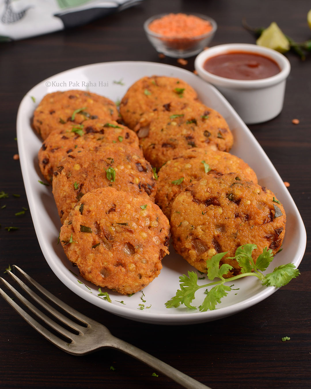 Masoor Dal Vada or Red lentil fritters.