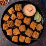 Paneer Popcorn or nuggets served with chilli lime mayo.