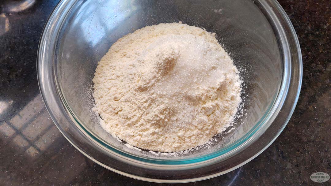 Mixing dry ingredients in a bowl.